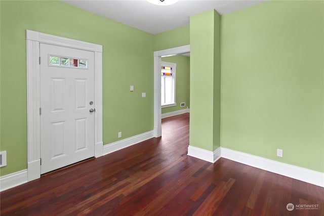 entrance foyer featuring dark hardwood / wood-style floors