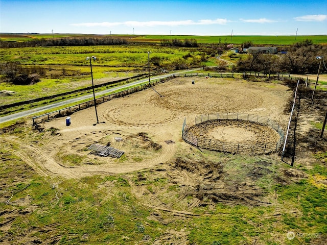 birds eye view of property featuring a rural view
