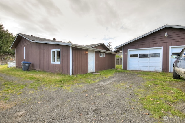 garage with wood walls