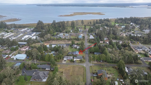 drone / aerial view with a water view