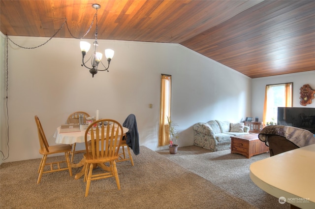 dining room with carpet flooring, a notable chandelier, vaulted ceiling, and wooden ceiling