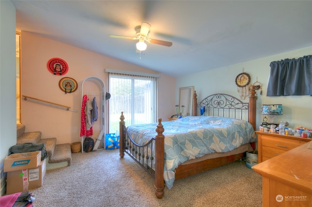 bedroom featuring carpet flooring, lofted ceiling, and ceiling fan