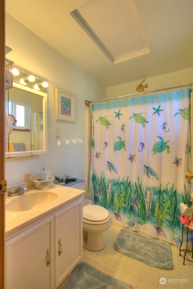 bathroom with walk in shower, vanity, and toilet