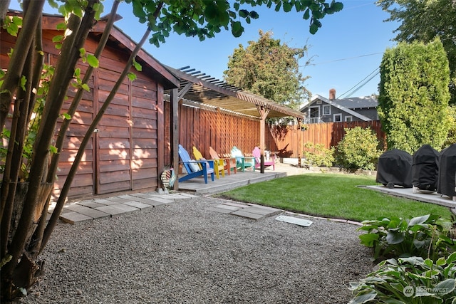 view of yard featuring a pergola and a patio area