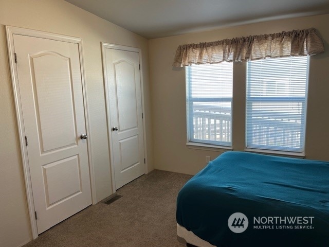 1257 Arkansas Dr, Walla Walla, WA 99362 - carpeted bedroom with vaulted ceiling
