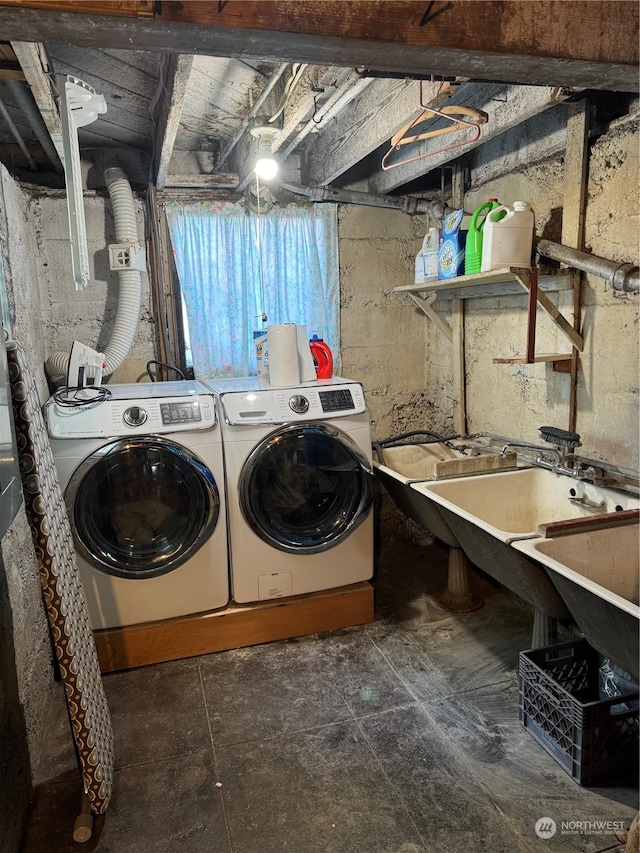 clothes washing area with independent washer and dryer