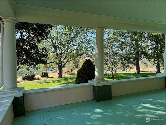 unfurnished sunroom with a wealth of natural light