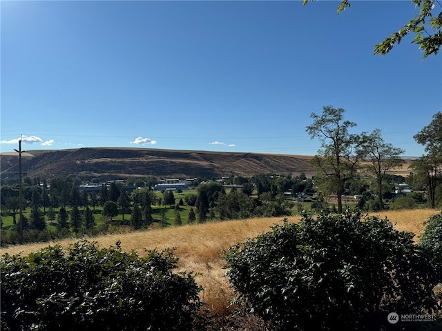 mountain view featuring a rural view