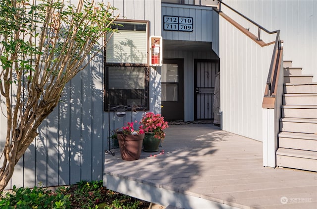 property entrance with a deck