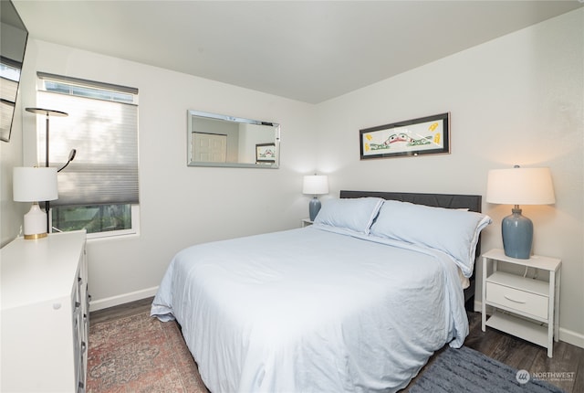 bedroom featuring dark hardwood / wood-style floors