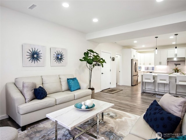 living room with hardwood / wood-style floors