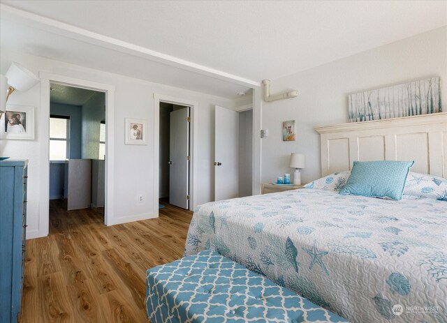 bedroom with light hardwood / wood-style floors