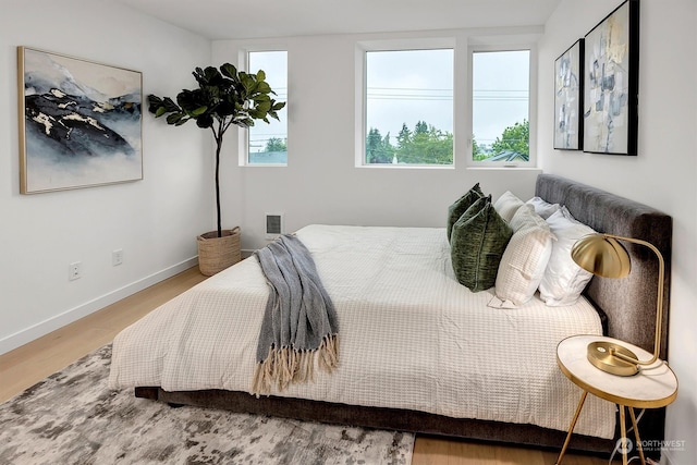 bedroom featuring wood-type flooring