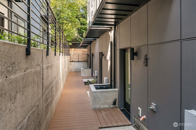 view of home's exterior with a wooden deck