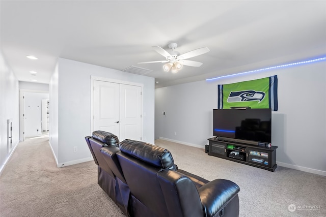 living room featuring ceiling fan and light carpet