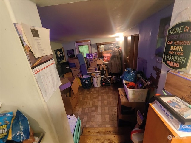 interior space featuring stone finish floor