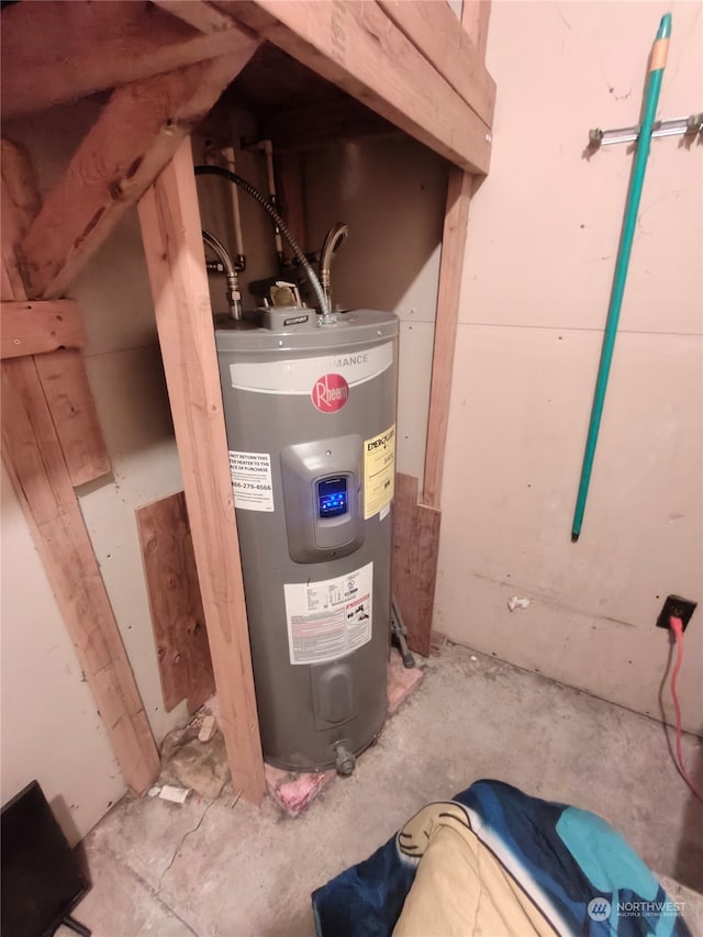 utility room with electric water heater