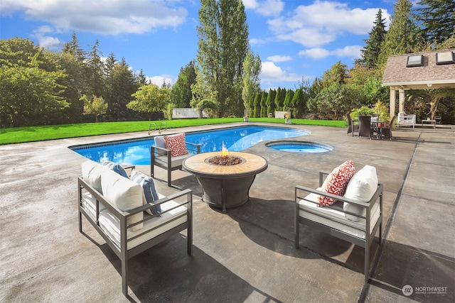 view of pool featuring a lawn, a patio, and outdoor lounge area