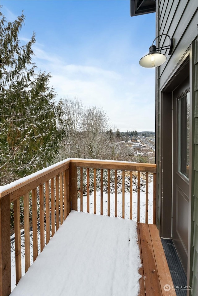 view of snow covered deck