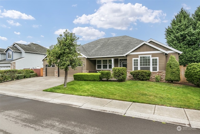 craftsman-style house with a garage and a front yard