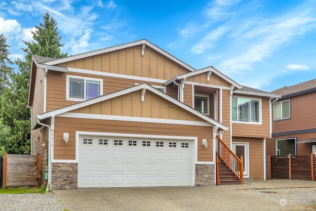 craftsman-style home featuring a garage