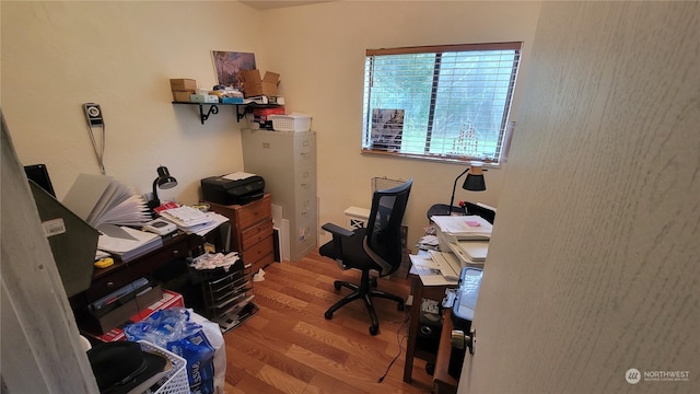 office area with light wood-type flooring