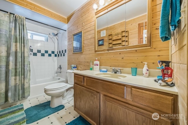 full bathroom featuring shower / tub combo, toilet, vanity, wooden walls, and tile patterned flooring