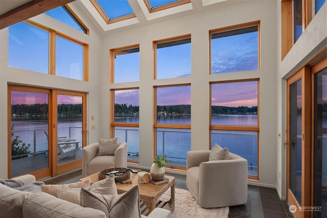 2210E Mason Lake Dr W, Grapeview, WA 98546 - sunroom / solarium featuring a water view, lofted ceiling, and a skylight