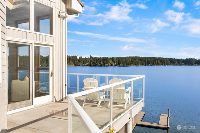 2210E Mason Lake Dr W, Grapeview, WA 98546 - dock with a balcony, a water view, and a forest view