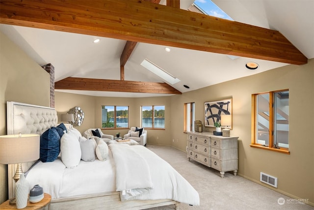 2210E Mason Lake Dr W, Grapeview, WA 98546 - bedroom with a skylight, light carpet, a water view, baseboards, and recessed lighting