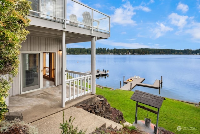 2210E Mason Lake Dr W, Grapeview, WA 98546 - dock area featuring a water view, a lawn, and a balcony