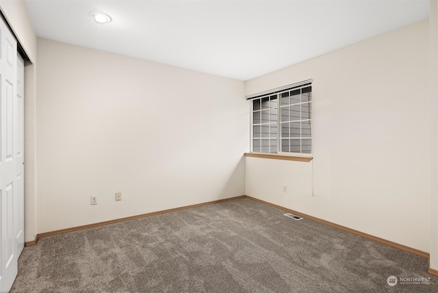 unfurnished bedroom featuring visible vents, baseboards, carpet floors, recessed lighting, and a closet