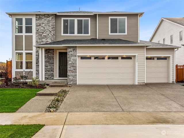 view of front of property with a garage