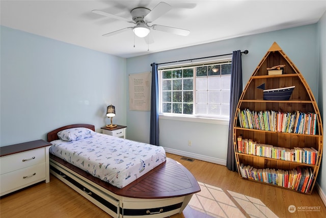 bedroom featuring ceiling fan and light wood-type flooring