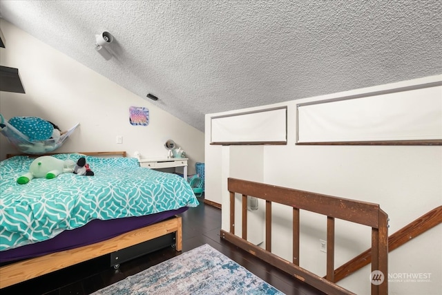 bedroom featuring a textured ceiling