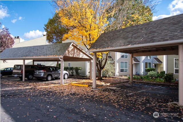 view of car parking featuring a carport