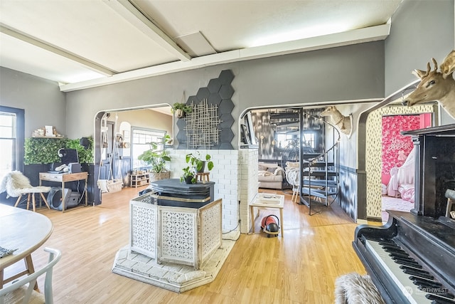 living room with hardwood / wood-style flooring and a wealth of natural light