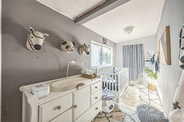 bathroom featuring vanity and vaulted ceiling