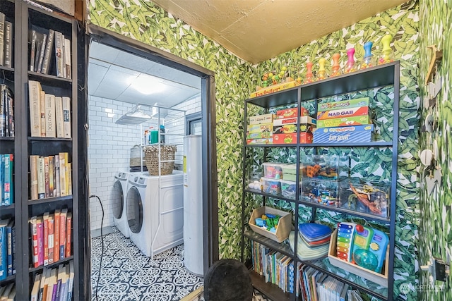 laundry room featuring separate washer and dryer and gas water heater