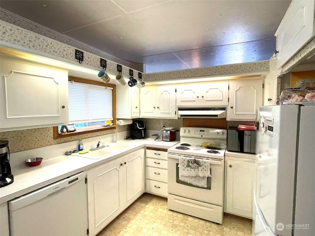 kitchen featuring white cabinets, white appliances, sink, and ventilation hood