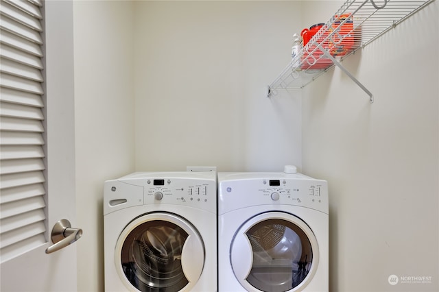 laundry area featuring washing machine and dryer