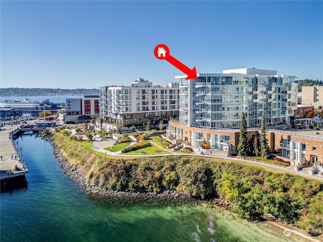 birds eye view of property featuring a water view