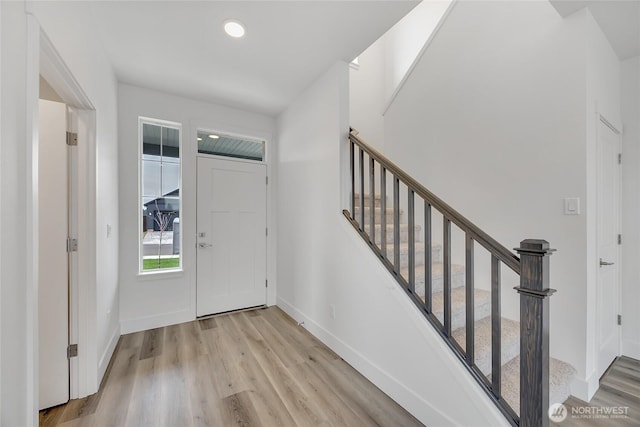 foyer with light hardwood / wood-style flooring