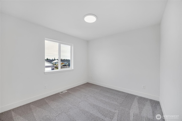 unfurnished room with carpet