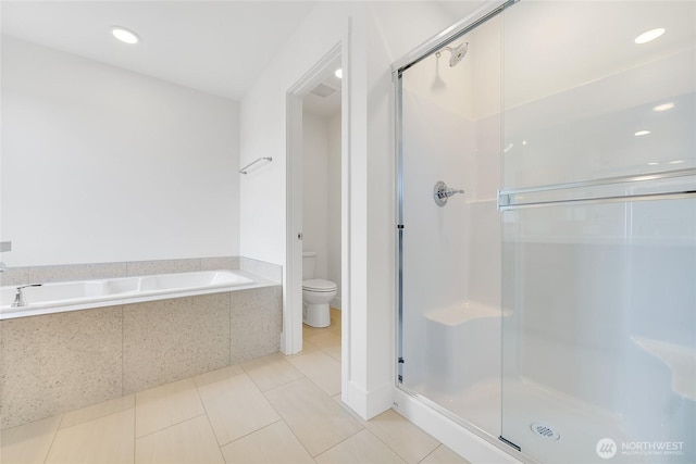 bathroom with separate shower and tub, tile patterned flooring, and toilet