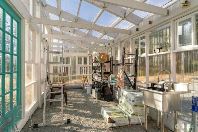 sunroom featuring vaulted ceiling