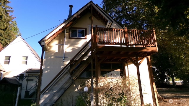 rear view of house with a deck