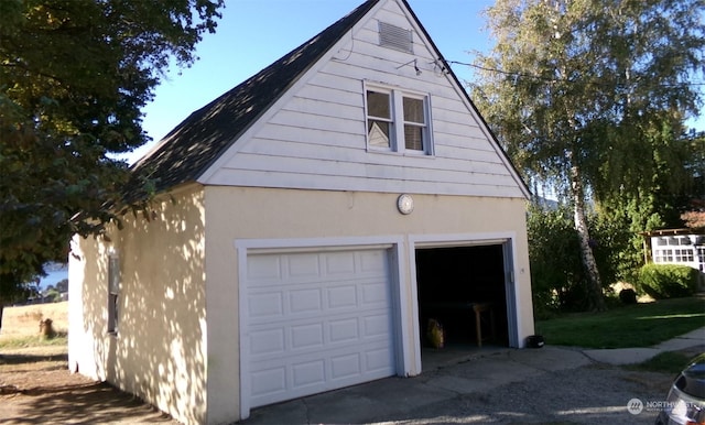 1555 Swartout Rd, Manson, WA 98831 - garage featuring a detached garage