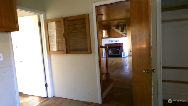 corridor featuring hardwood / wood-style flooring