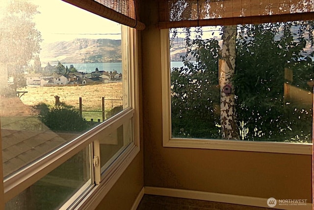 1555 Swartout Rd, Manson, WA 98831 - unfurnished sunroom with a mountain view